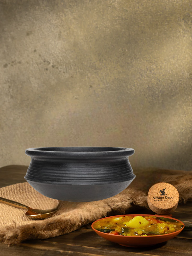 Earthen Black clay cooking pot ideal for preparing a variety of traditional dishes like Non Veg,Fish Curry and veg Saute etc.,