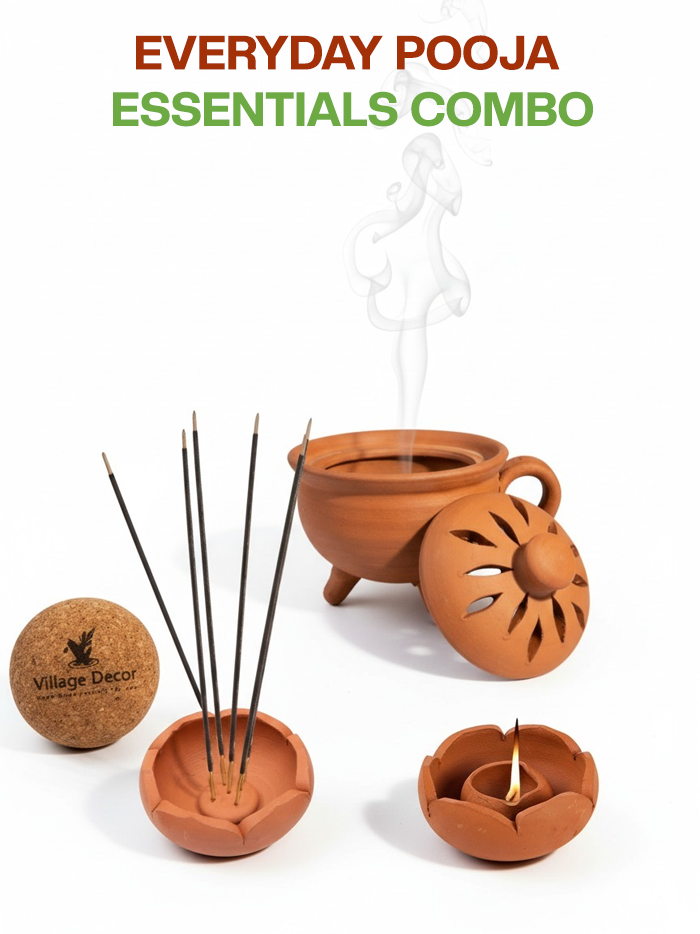 Handcrafted clay pooja set including lotus lamp, incense holder, and stand on white backdrop