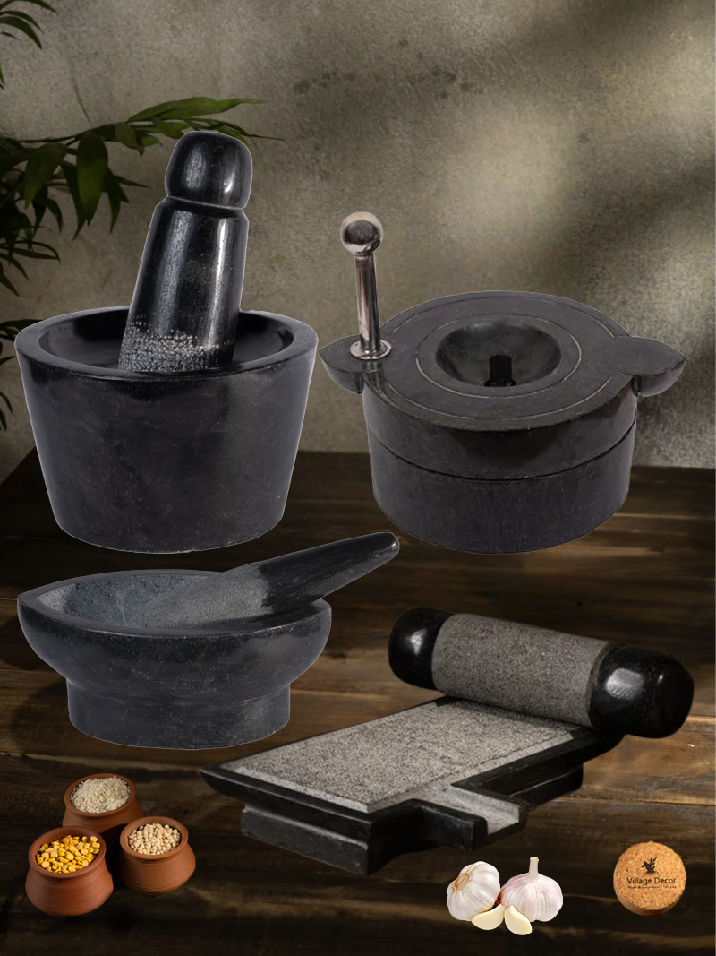 Handmade Silbatta, Rubbu Rolu, Attachakki and kharal stone kitchen tools placed on a rustic wooden surface with lentils and garlic for traditional cooking.