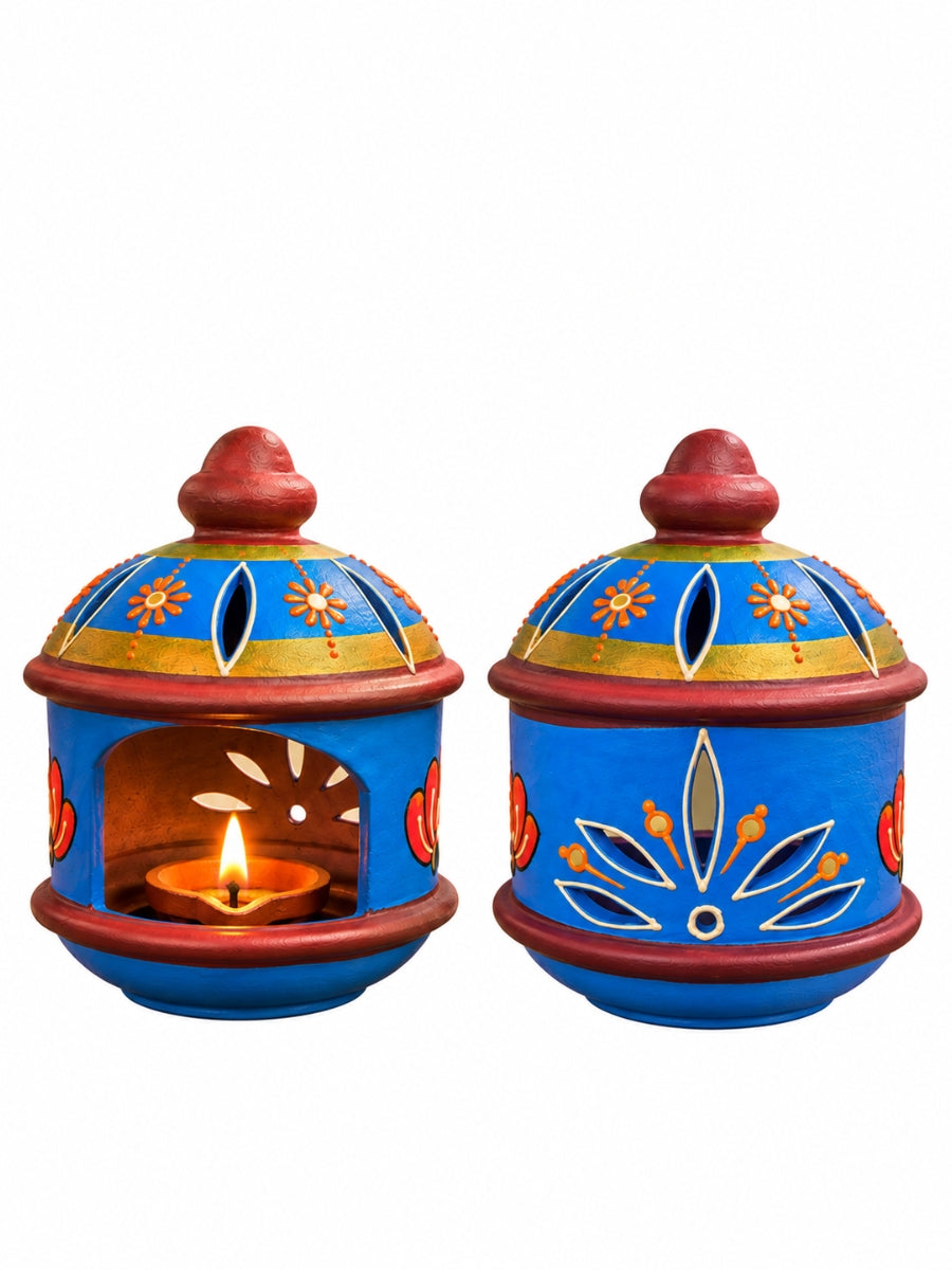 Temple blue round hut-shaped terracotta diya displayed on a white background, featuring traditional handpainted details and a 6-inch height