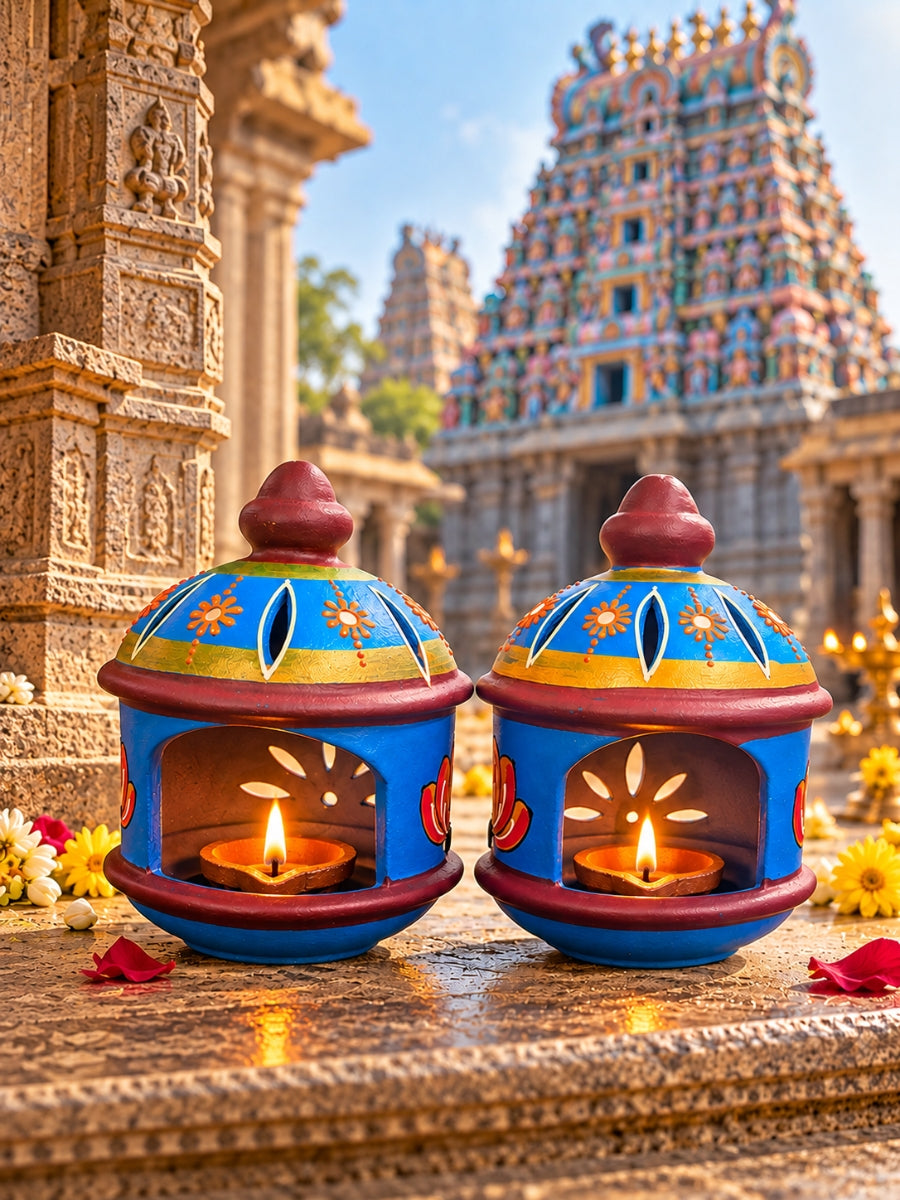 Temple blue round hut-shaped diya, 6 inches tall, displayed on a white background with handpainted terracotta details inspired by traditional temple architecture