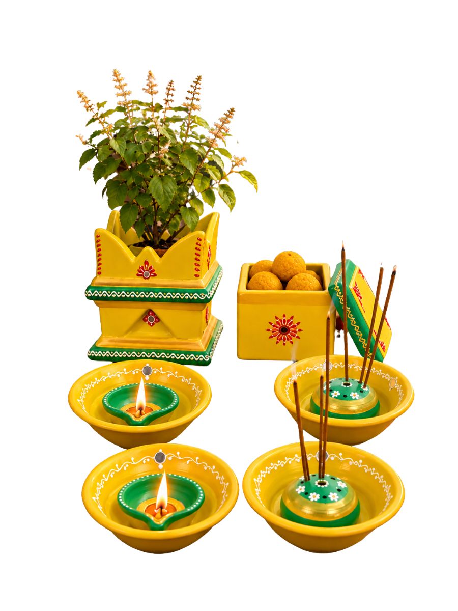 Temple yellow terracotta gift set displayed against a white background, featuring 2 incense stick holders, 2 plate diyas, 1 mini tulsi pot, and 1 decorative box with traditional handpainted details.