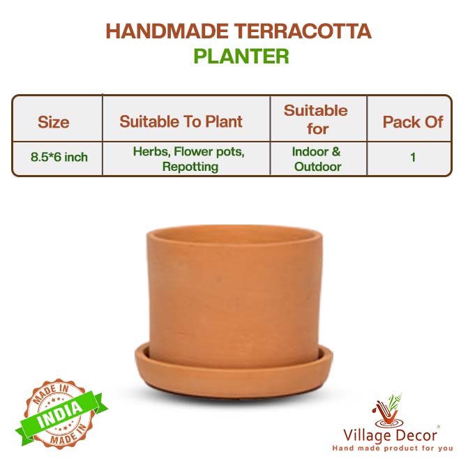 Handcrafted Terracotta Planter In A Smooth Cylinder Shape With Matching Saucer, Ideal For Enhancing Indoor And Outdoor Garden Decor.