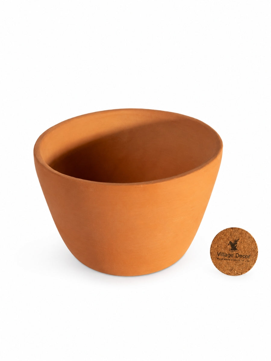 Terracotta Planter pot white background view—perfect flower pot for indoor and garden spaces with a natural terracotta finish.