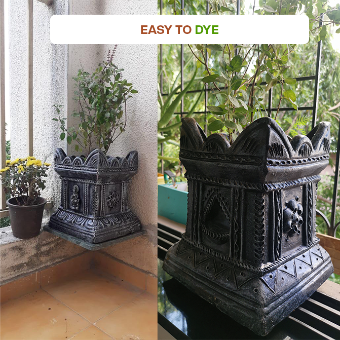 Terracotta Tulsi pots painted with white decorative patterns, showing how easily the surface can be dyed or customized for festive decor.