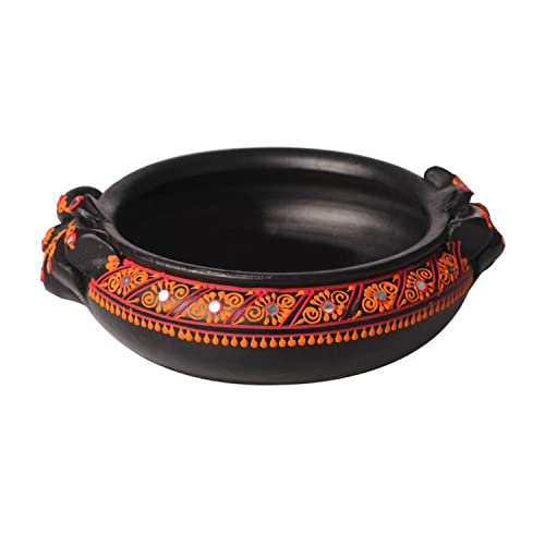 Top view of a colorful handpainted terracotta urli with floral art, placed on a white background, ideal for festive decor or pooja setups.