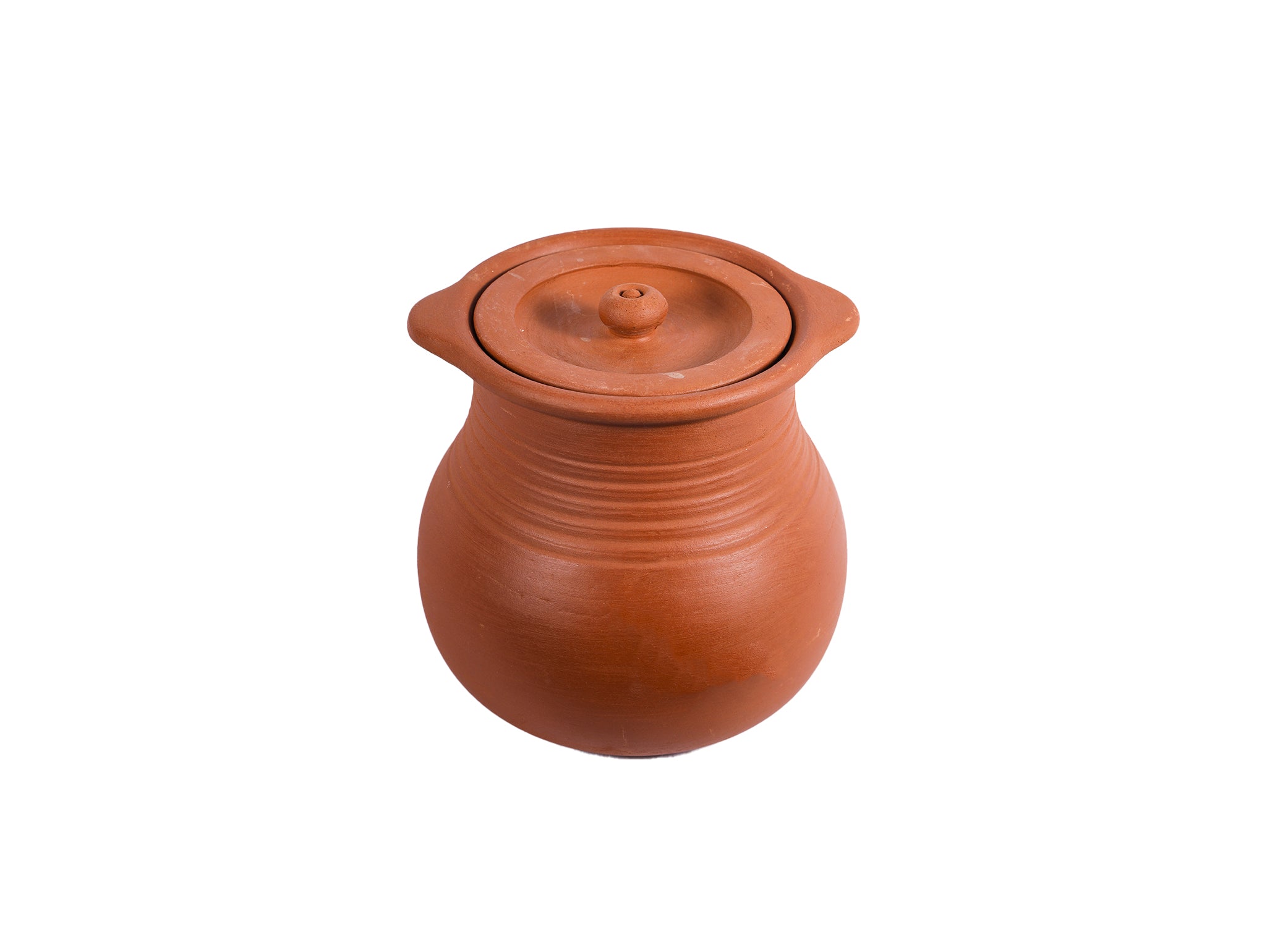 Authentic earthen clay pongal pot used in South Indian festivals like Thai Pongal for traditional cooking rituals.