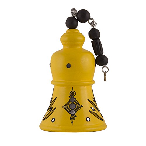 Close-up view of handcrafted terracotta hanging bell showing intricate design details for traditional home decor.