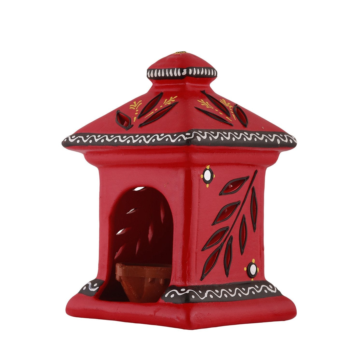 Side view of a yellow terracotta hut-shaped oil lamp with hand-painted floral and leaf designs, featuring a small clay diya inside.