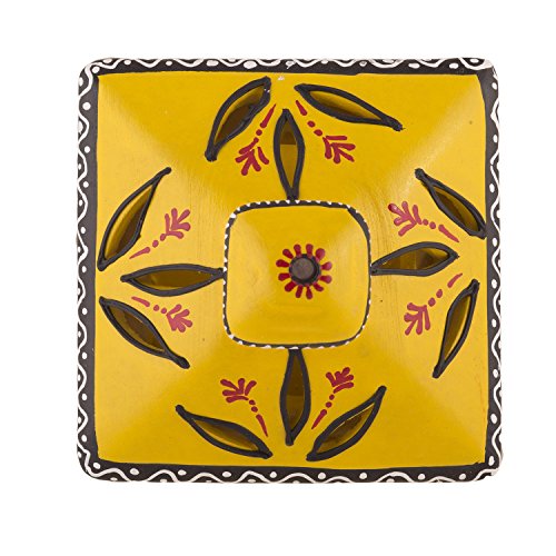 Top view of a square-shaped terracotta hut-style diya with hand-painted floral designs in yellow, black, and red.