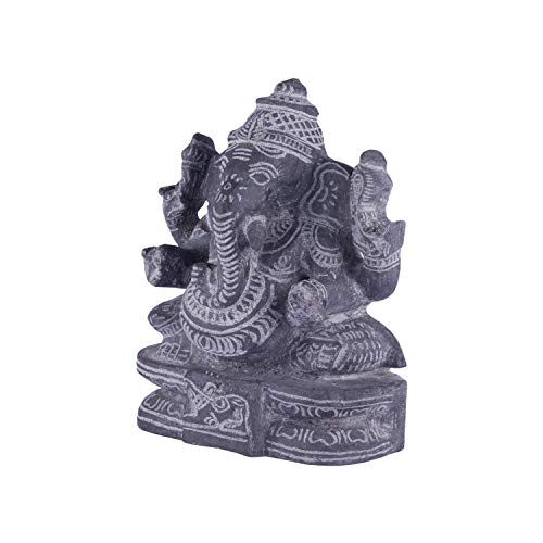 Left side view of handcrafted black stone Ganesha idol with intricate carvings for spiritual and decorative use.