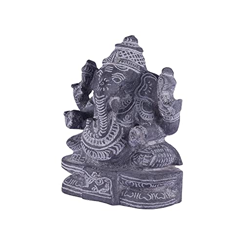 Left side view of handcrafted black stone Ganesha idol with intricate carvings for spiritual and decorative use.