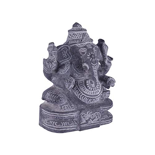 Side angle view of black stone Ganesha idol showing detailed carvings, handcrafted sculpture for pooja and decor.