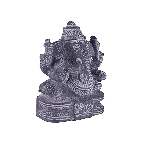 Side angle view of black stone Ganesha idol showing detailed carvings, handcrafted sculpture for pooja and decor.