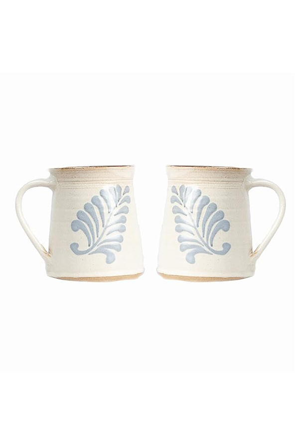 Pair of ceramic mugs with handles, displayed on a white background, featuring a glossy finish and modern design.
