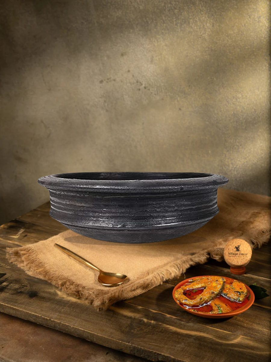 Earthen Black clay cooking pot ideal for preparing a variety of traditional dishes like Non Veg,Fish Curry and veg Saute etc.,