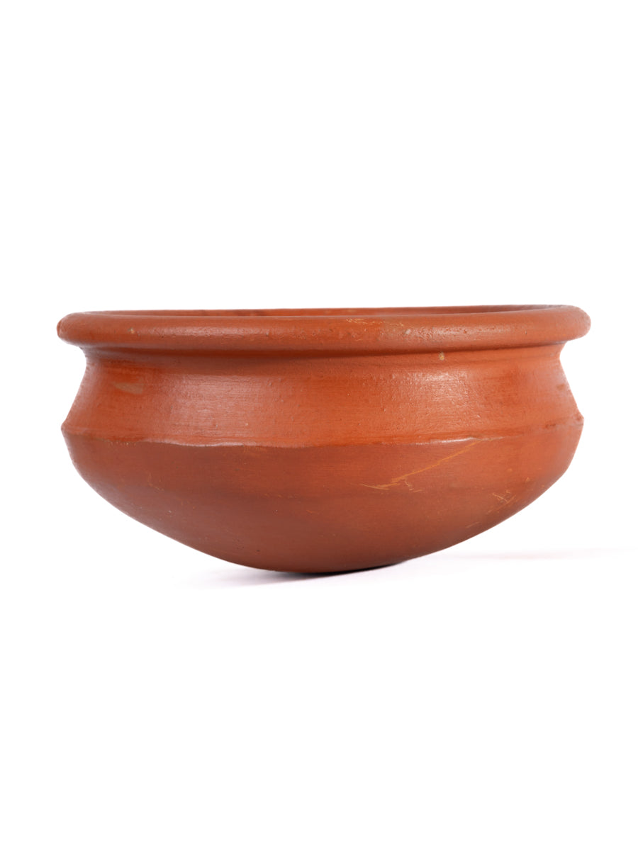 Natural finish Clay cooking pot also called as Mitti ke Bartan used for Indian cooking, showcasing rustic texture and ideal for slow-cooking.
