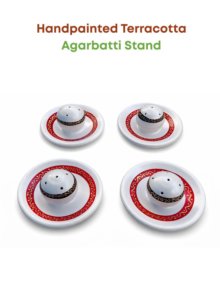 Handpainted vathi stand on a white background view