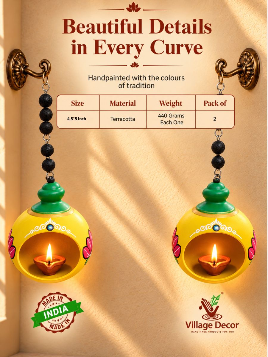 Detailed view of the 4.5-inch temple yellow handpainted terracotta hanging doom diya, highlighting its traditional temple-inspired patterns and decorative craftsmanship for pooja and home decor.