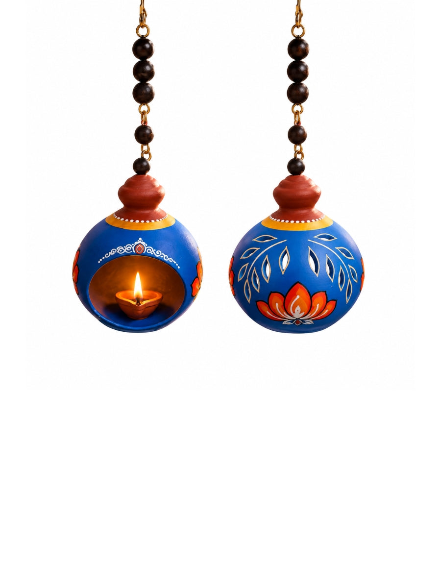 Temple blue hanging doom-shaped terracotta diya displayed on a white background, featuring traditional handpainted details, a 4.5-inch diameter, and a 5-inch height.