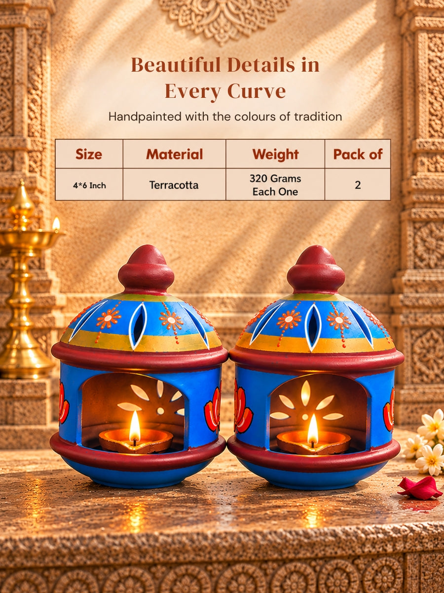 Detailed view of the temple blue round hut-shaped terracotta diya, highlighting its traditional handpainted design for pooja and festive home decor
