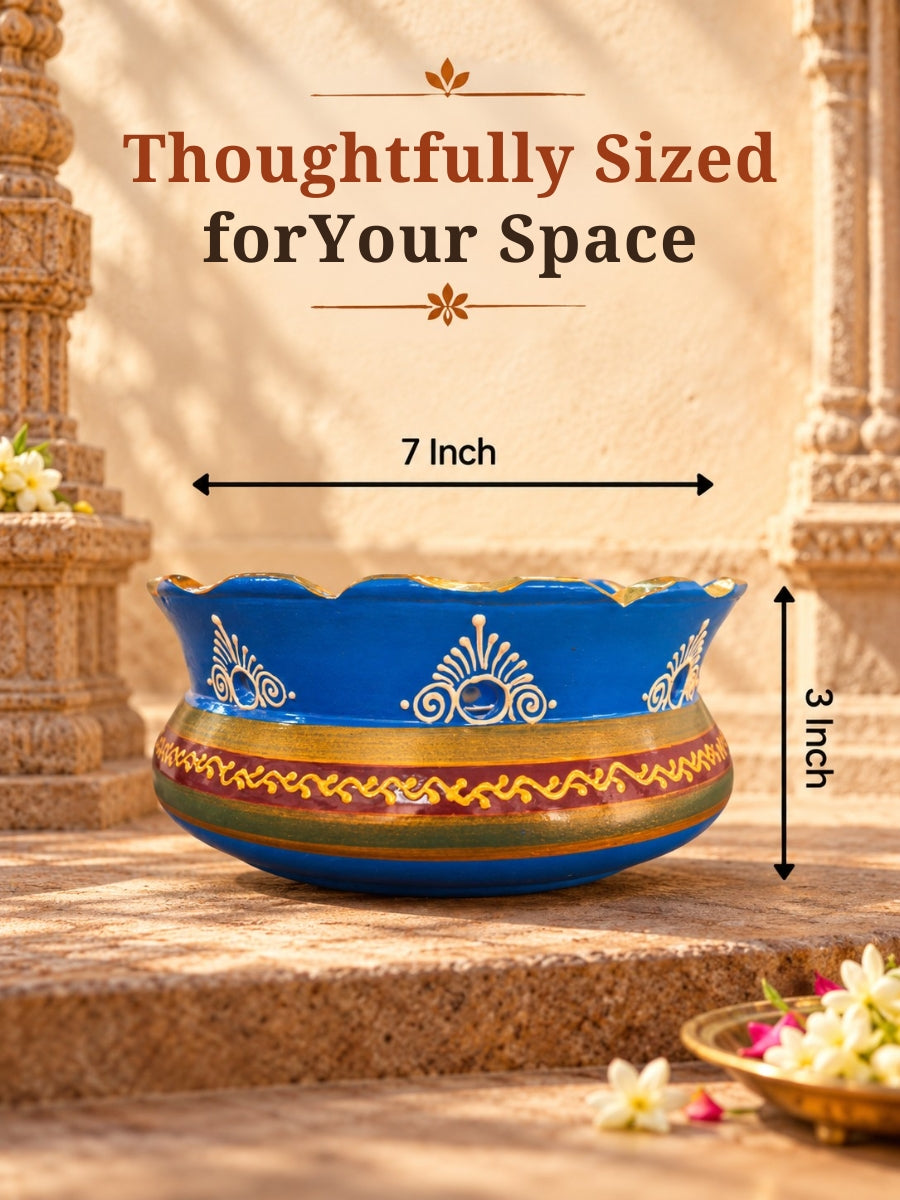 Dimensions of the temple blue Vallalar terracotta diya, showcasing its 7-inch size and traditional handpainted design for pooja and festive decor.
