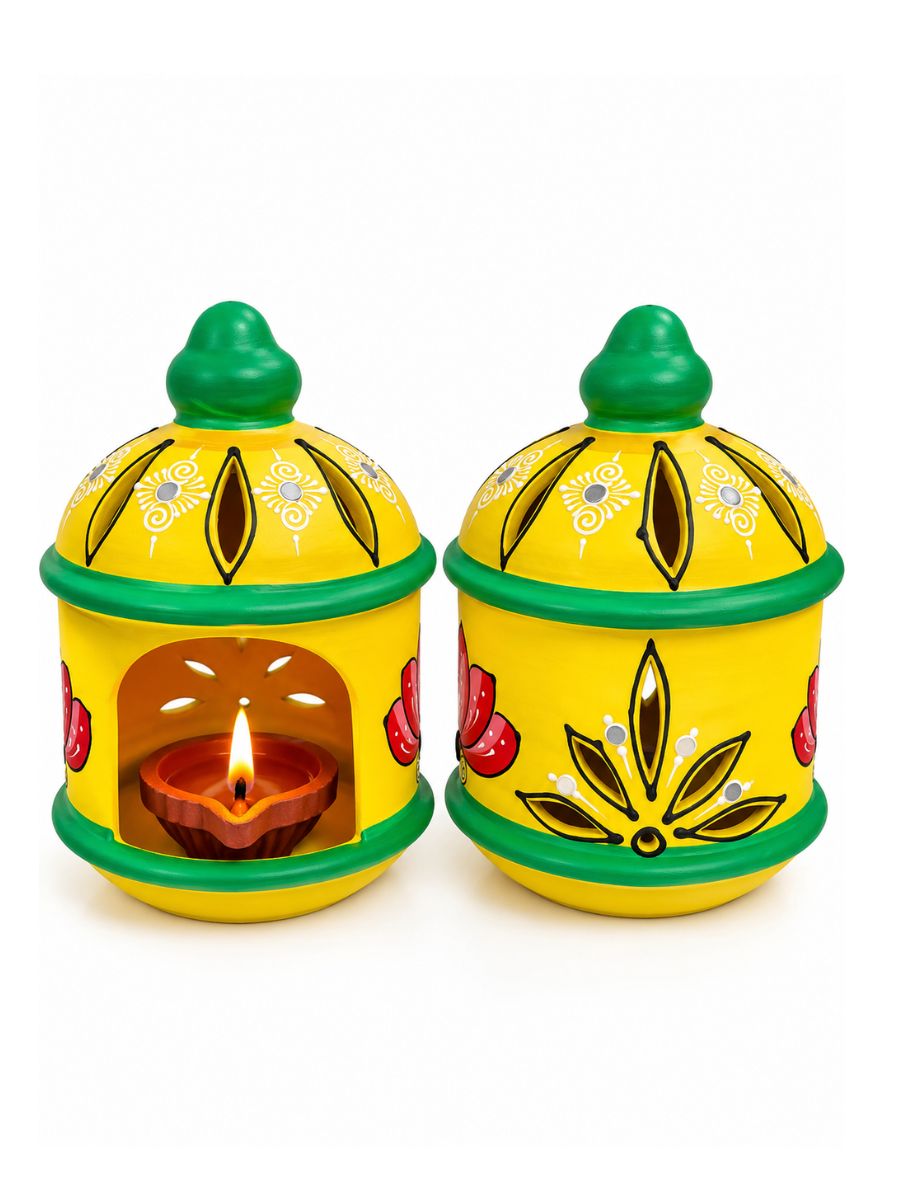 6-inch temple yellow round hut-shaped handpainted terracotta diya displayed against a white background, showcasing its traditional design and decorative details for pooja and home decor.