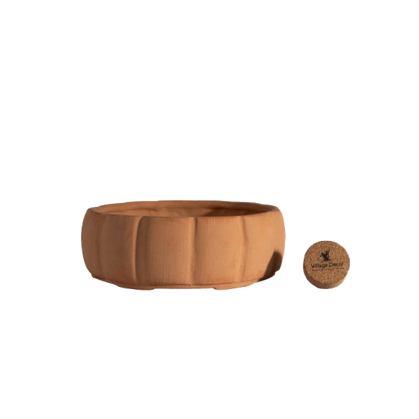 Round shape bonsai planter with white background view—perfect flower pot for indoor and garden spaces with a natural terracotta finish.

