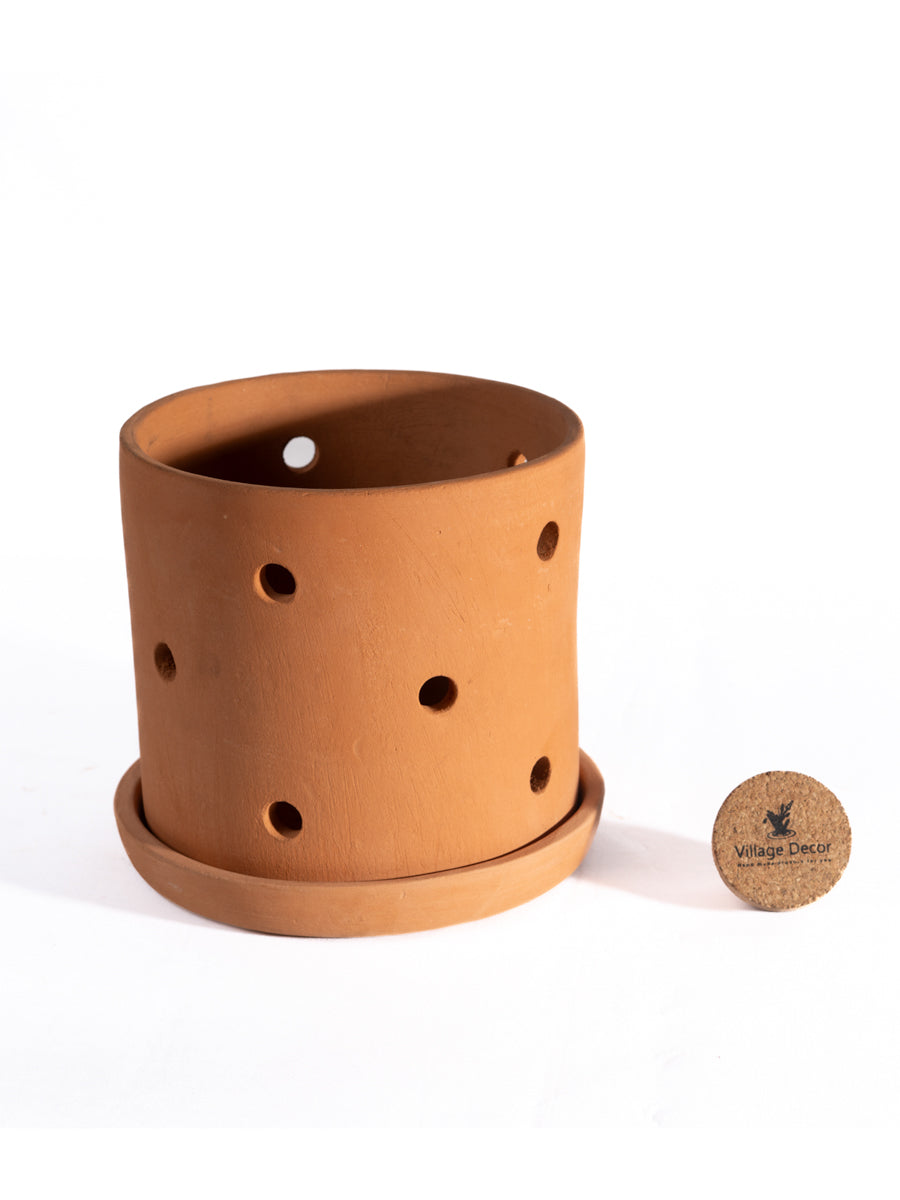 Terracotta Cylinder Shape Hanging Orchid  planter pot with side drainage holes, ideal for indoor herbs, small houseplants, or balcony decor.
