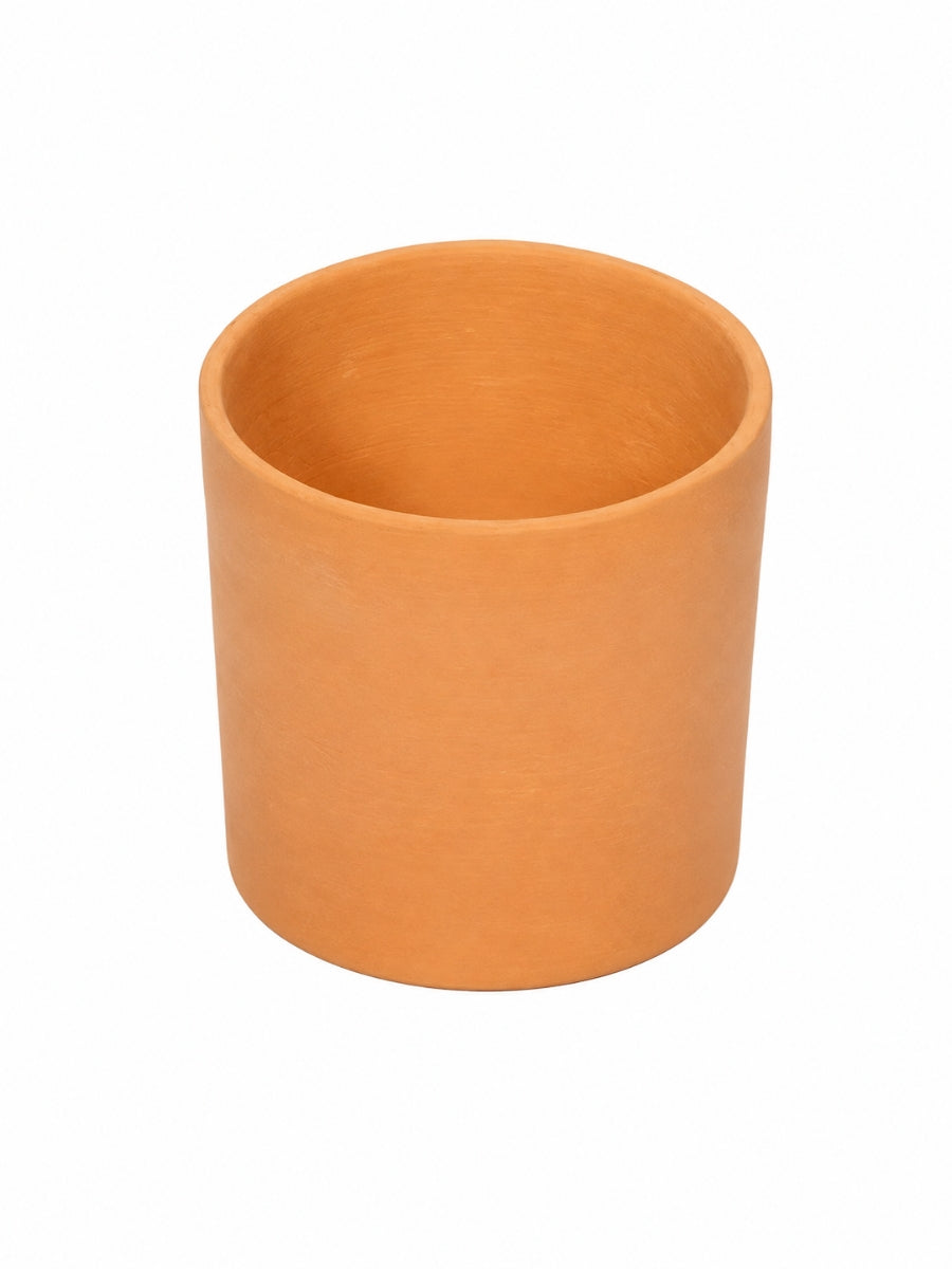 Plain terracotta planter with a round base plate, showcasing a smooth cylindrical shape and natural clay texture against a white background.
