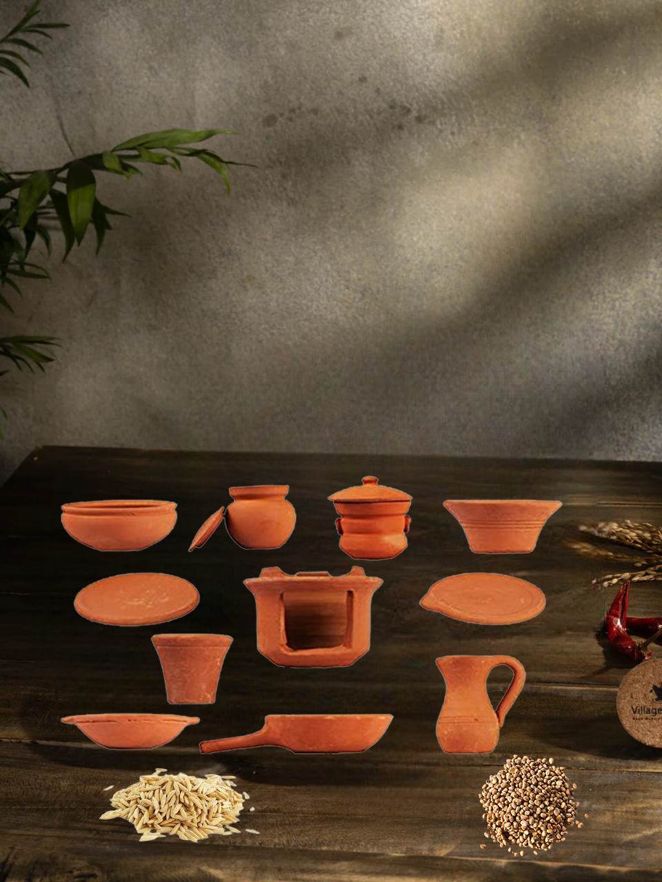 Terracotta kitchen playset for kids displayed in a lifestyle setting, showing all 12 clay pieces on a wooden surface with grains and spices around