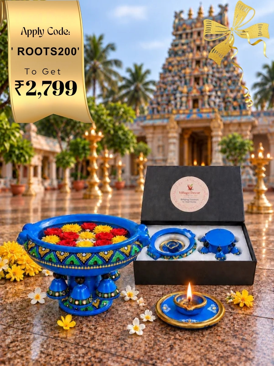 Temple Blue Urli showpiece vastu bowl with handpainted traditional artwork, flowers and diya for a beautiful South Indian inspired decor display.