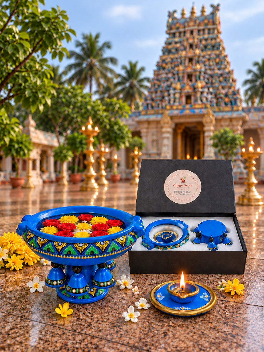 Temple Blue Urli showpiece vastu bowl with handpainted traditional artwork, flowers and diya for a beautiful South Indian inspired decor display.